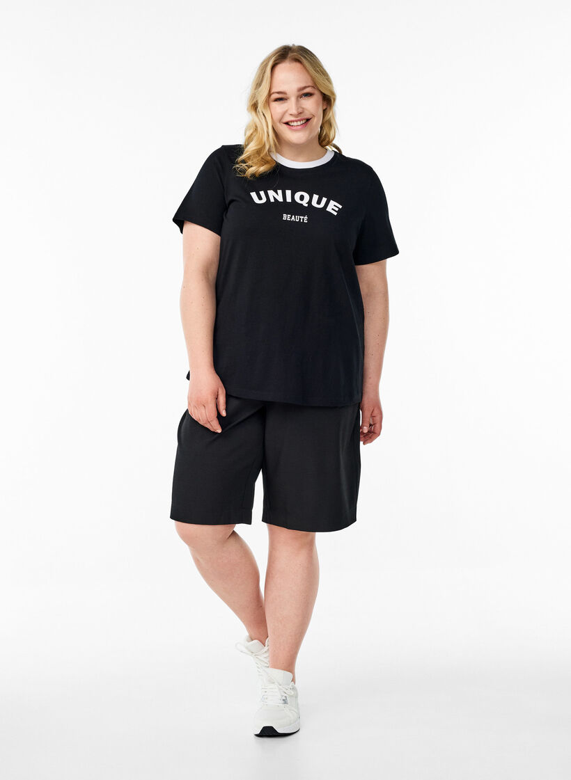 T-Shirt mit Textdruck und Kontrastbesatz, Schwarz, Model image number 1