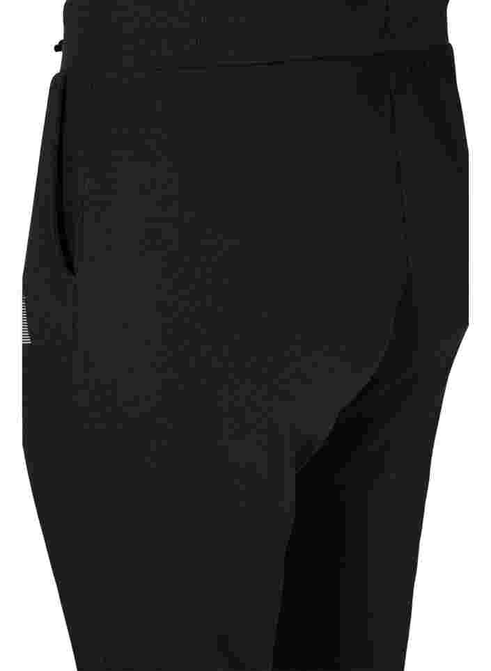 Einfarbige Trainingshose mit Taschen, Black, Packshot image number 3
