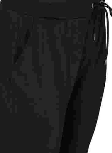 Lockere Trainingshose mit Taschen, Black, Packshot image number 2
