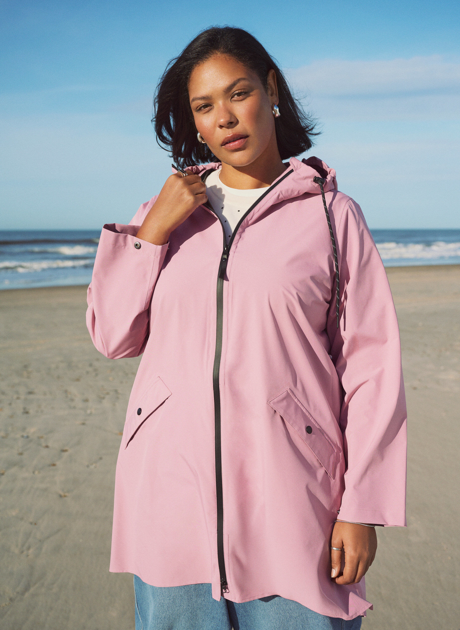 Regenjacke mit Taschen und Kapuze