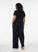Pyjamahose mit Rippstruktur und gebl&uuml;mtem Print, Schwarz, Model image number 1