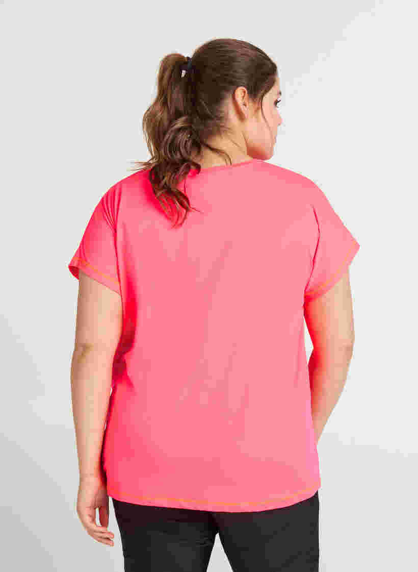 Einfarbiges Trainings-T-Shirt, Neon pink, Model image number 1