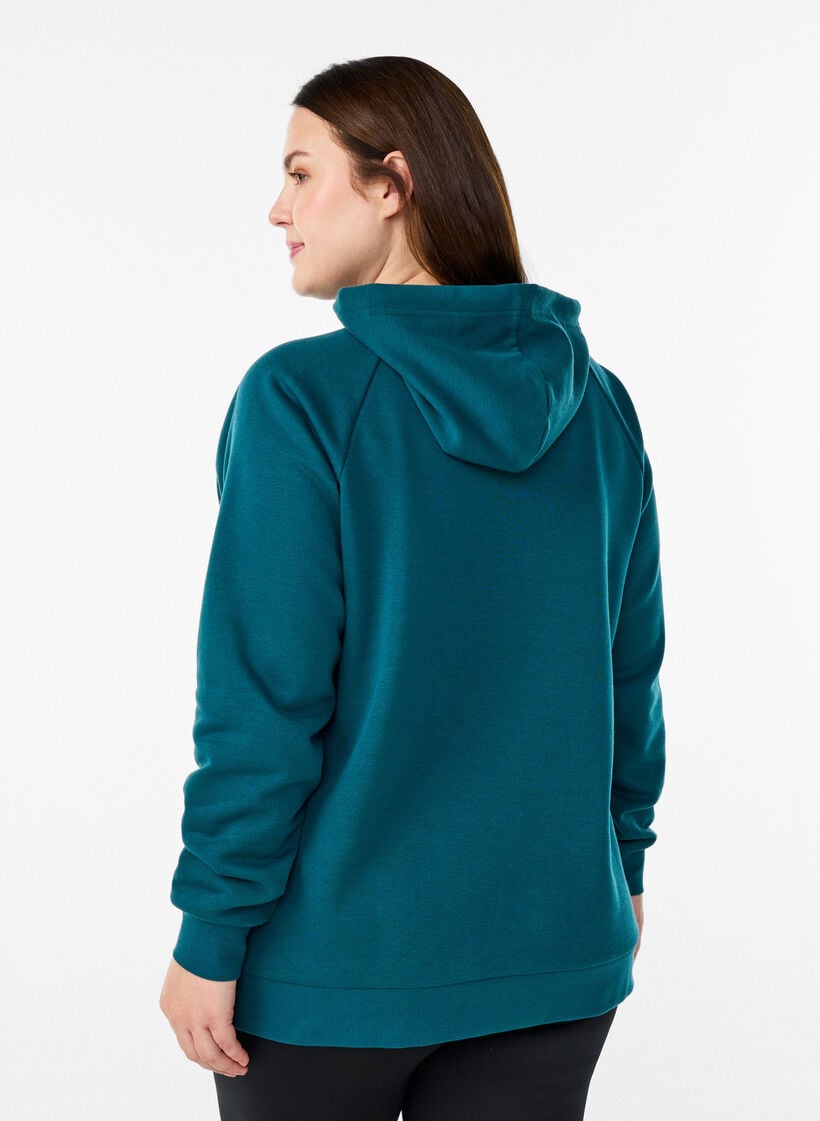 Hoodie mit gesticktem Frontmotiv, Gr&uuml;n, Model