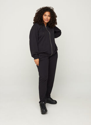 Lockere Sweatpants aus 100% Baumwolle, Black, Model image number 1