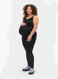 Schwangerschafts-Jeggings mit Taschen hinten, Black, Model
