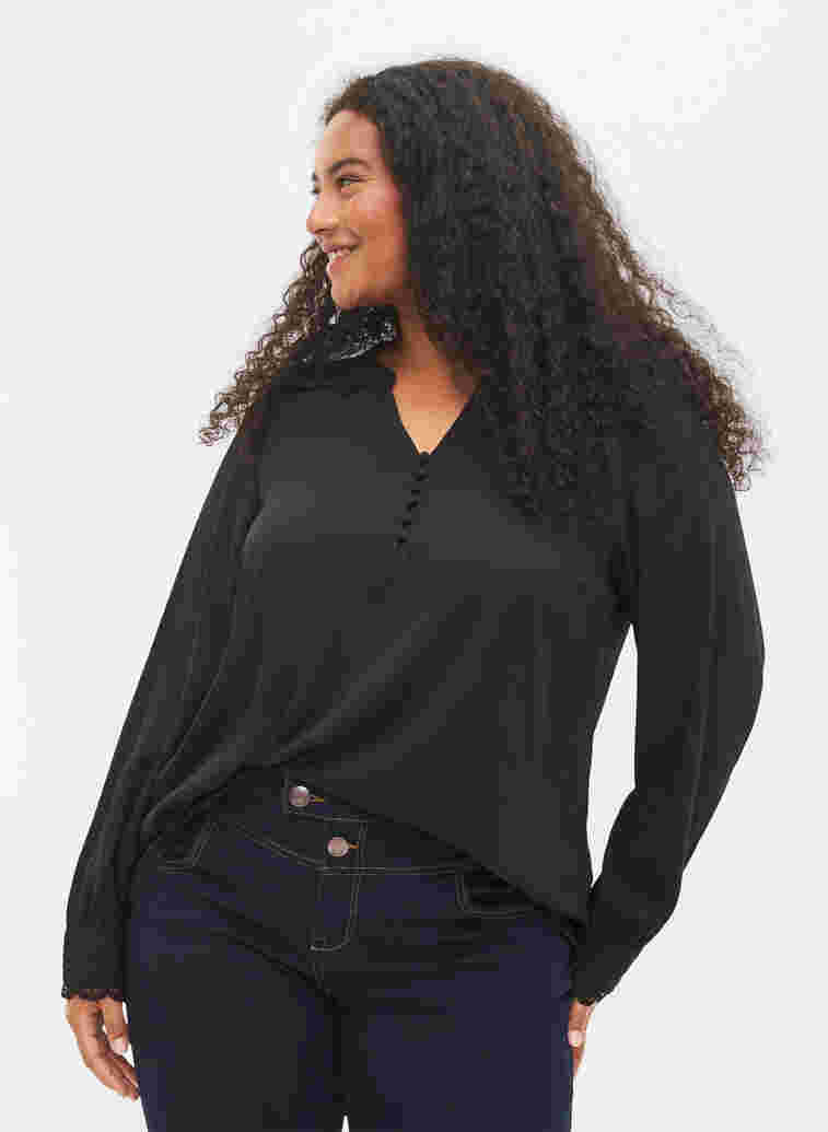 	 Langärmelige Bluse mit V-Ausschnitt, Black, Model image number 0