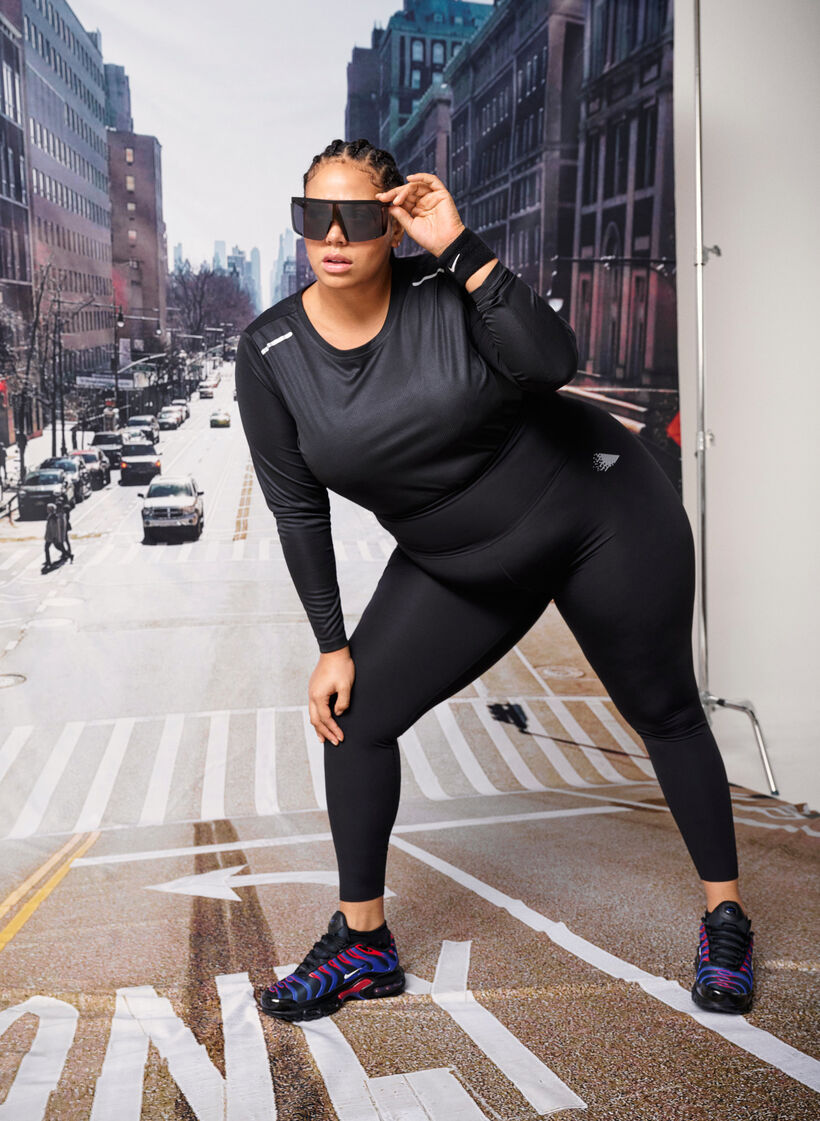 Trainingsbluse mit langen Ärmeln und reflektierenden Details, Black, Image image number 0