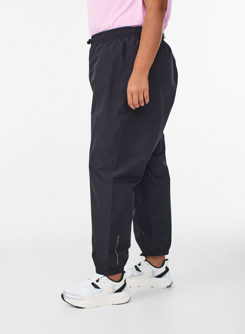 Regenhose mit Reflektoren, Schwarz, Model image number 0