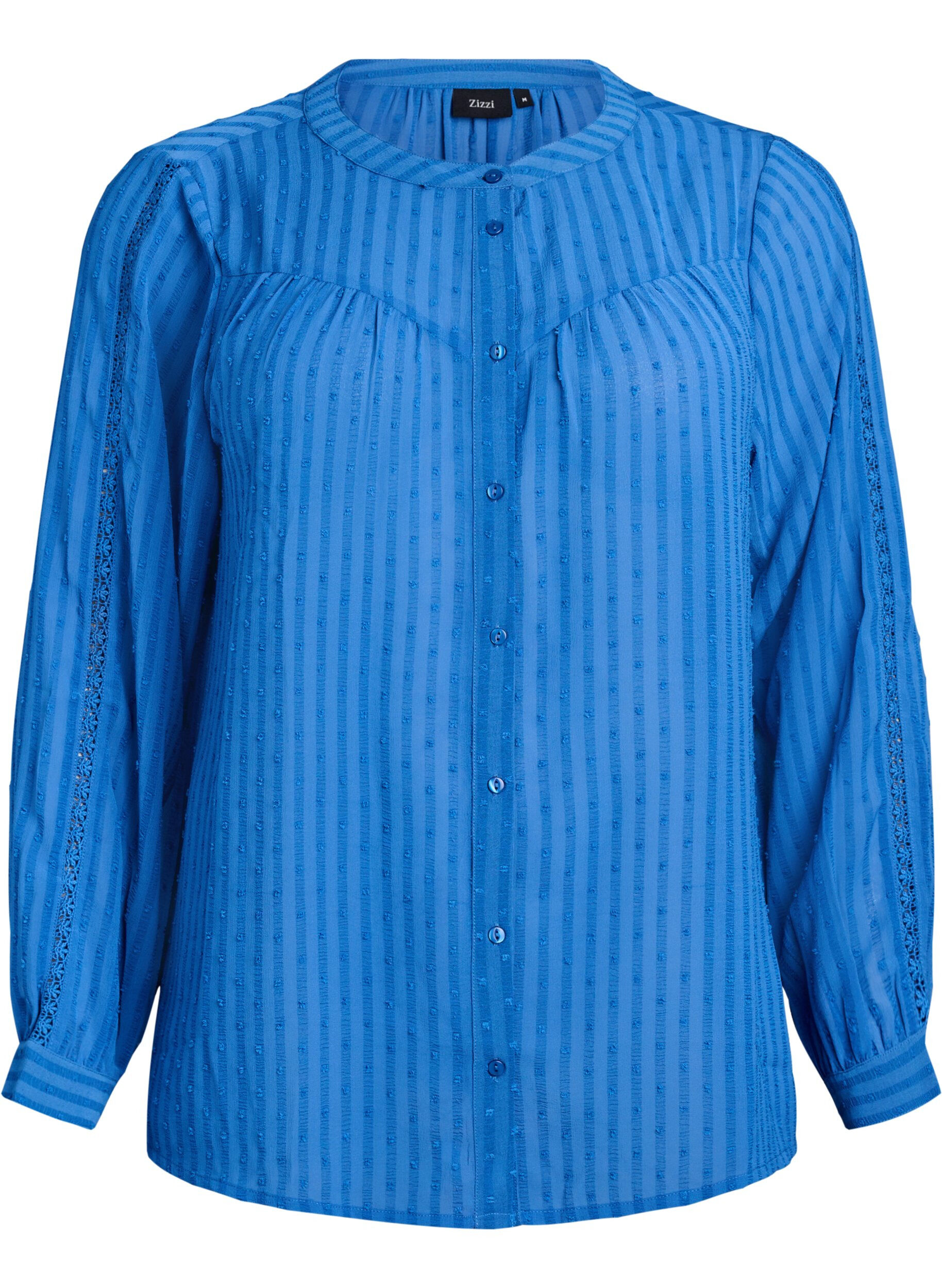 Bluse mit strukturiertem Punktemuster und Stickereidetails