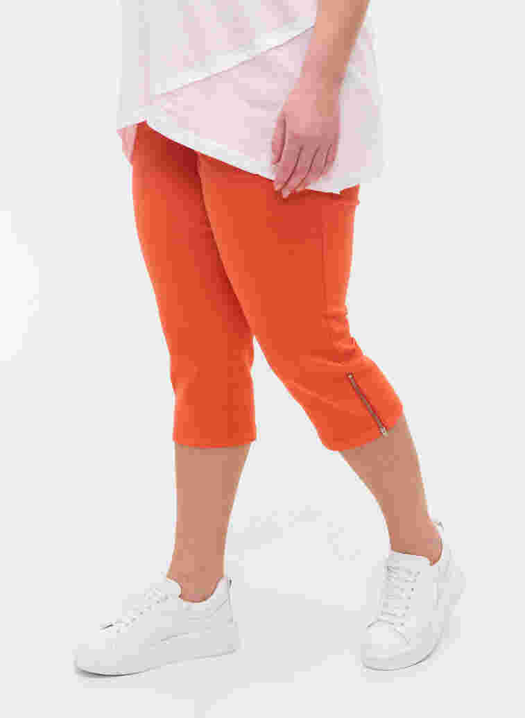 Eng sitzende Capri-Hose mit Reißverschluss, Orange , Model image number 1