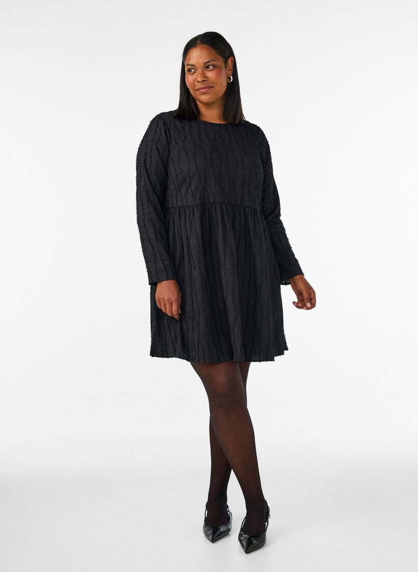 Kurzes Jerseykleid mit welligem Strukturmuster, Schwarz, Model image number 1