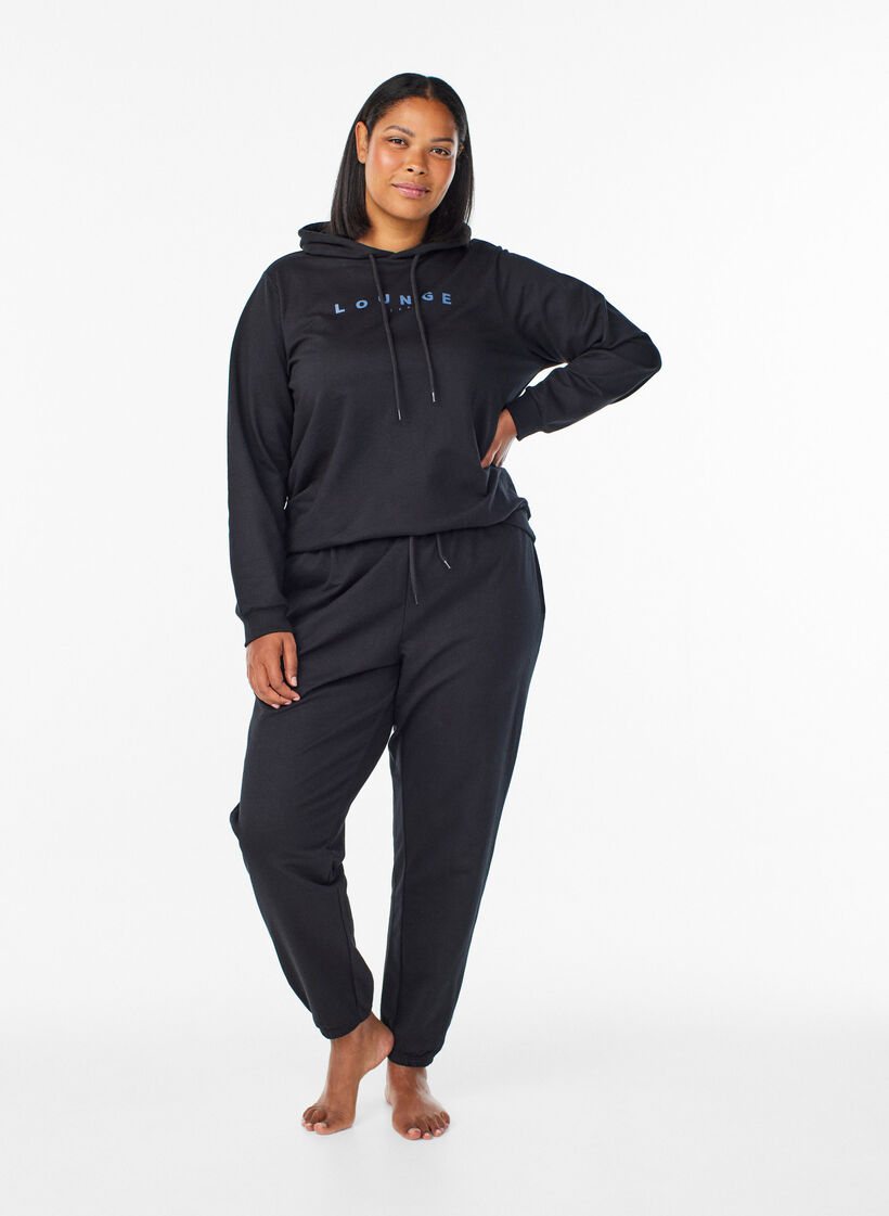 Jogginghosen mit Taschen, Schwarz, Model image number 0