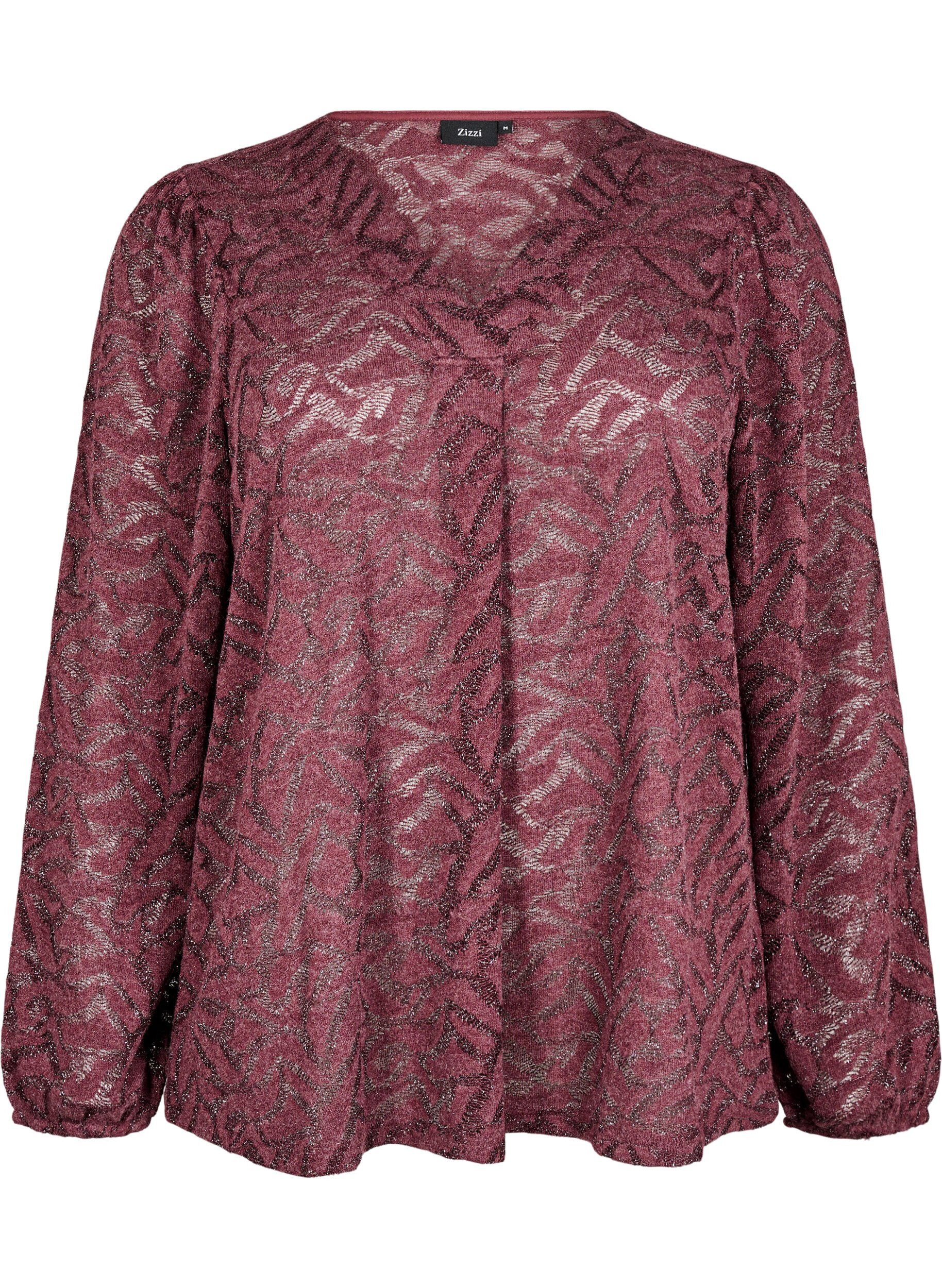 Lang&auml;rmlige Bluse mit Glitzer und Muster